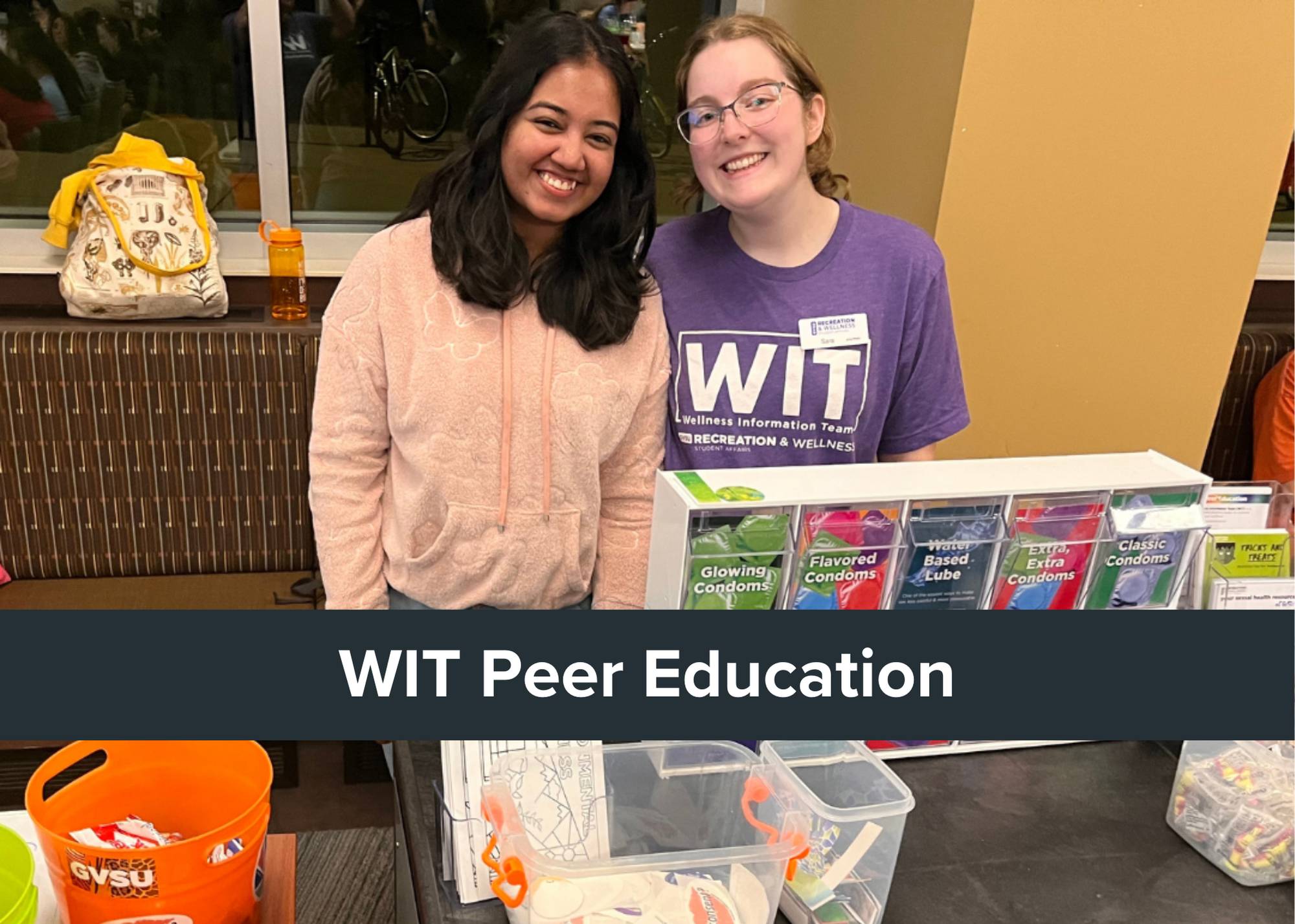 Says "WIT Peer Education" with photo of peer educators behind WIT cart